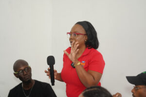 women with a microphone talking